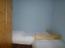 Eines der anderen Schlafzimmer mit 2 Einzelbetten.